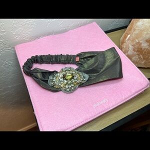 Headband, sparkling fabric and stunning brooch